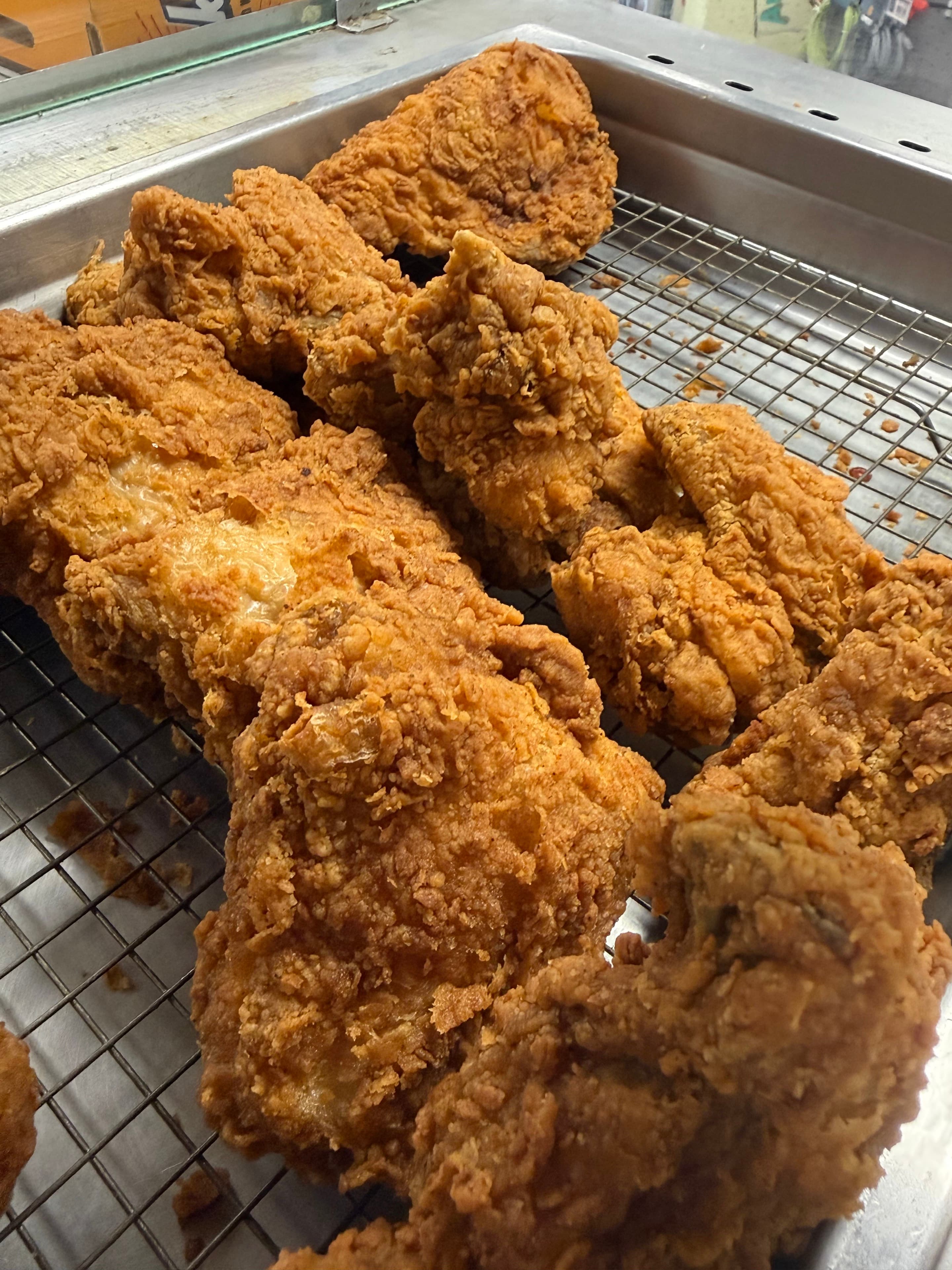 Chester's bone-in fried chicken in the Big John's hot case